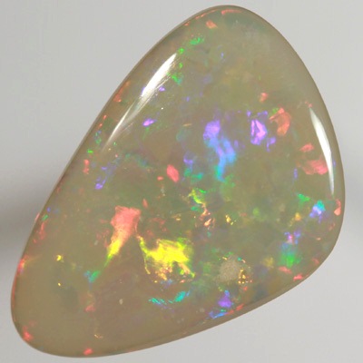 SOLID SEMI BLACK OPAL  Very bright fire, Floral Harlequin pattern. Top quality. SEE VIDEO